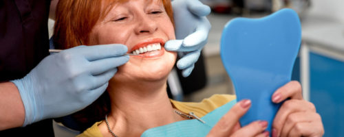 Senior woman in the dental office.