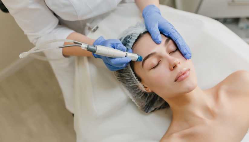 view-from-rejuvenation-beautiful-woman-enjoying-cosmetology-procedures-beauty-salon-dermatology-hands-blue-glows-healthcare-therapy-botox (1)